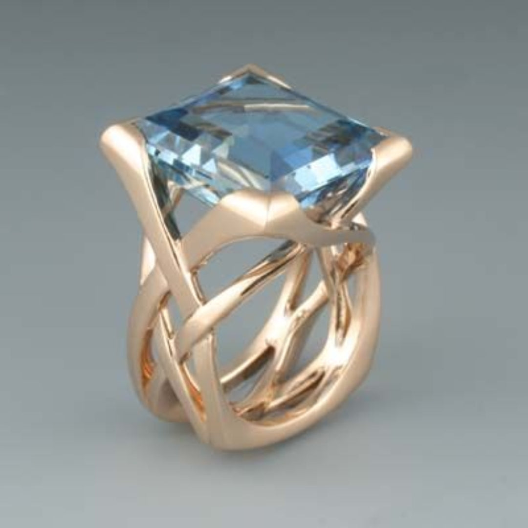 Timeless Rose Gold Blue Zirconia Ring