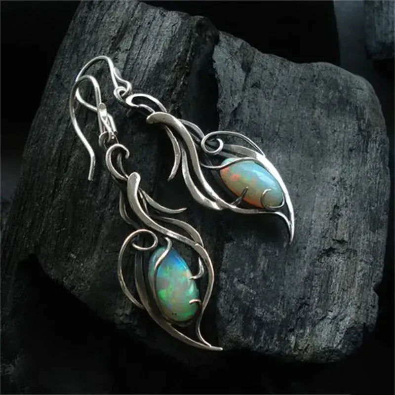 Stylish earrings made of blue opal